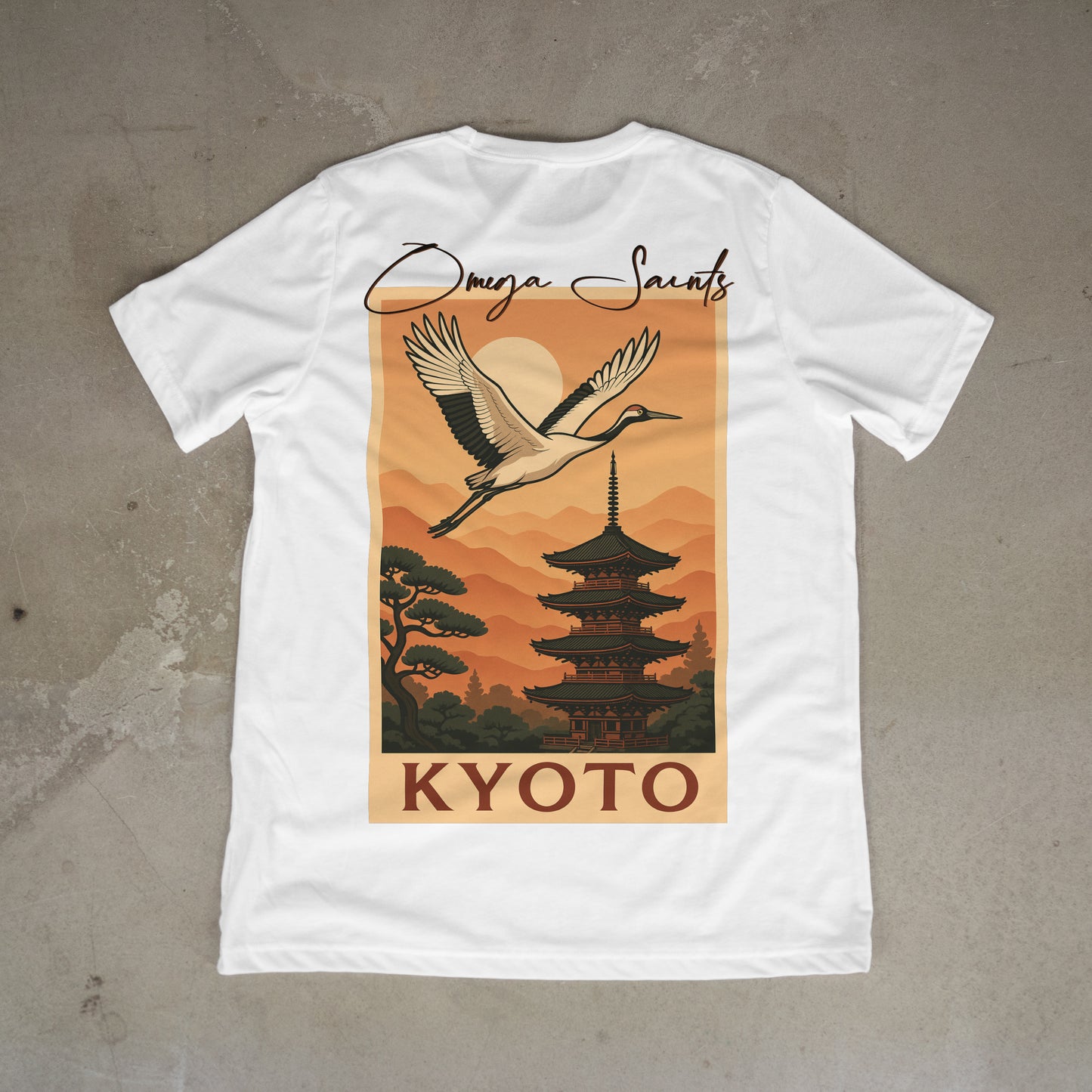 White t-shirt with a graphic of a crane, pagoda, and 'Kyoto' text on a concrete surface